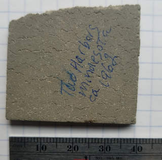 Cloes-up of 1960s asphalt asbestos floor tile pattern face (C) Daniel Friedman at InspectApedia.com