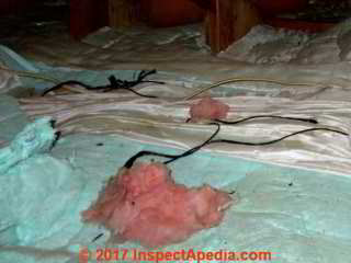 Blue fiberglass insulation (C) InspectApedia.com