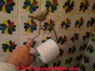 Toilet paper holder squeaking (C) Daniel Friedman
