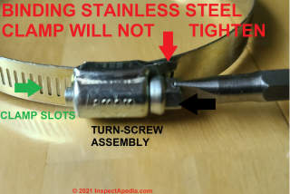 Stainless steel hose clamps used on plastic pipes, tubing, hoses will leak if the clamp is damaged and/or cannot be tightened properly (C) Daniel Friedman at InspectApedia.com