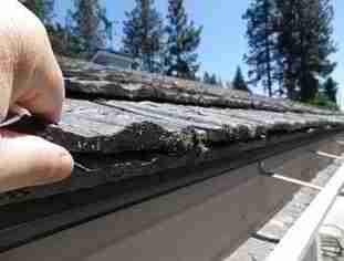 American Cemwood roof installation (C) Hugh Cairns D Friedman