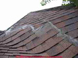 Photograph of GAF shingles improperly applied on a domed roof