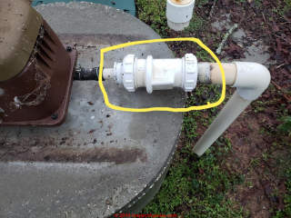 Loose coupling on air piping at aerobic septic prevents proper aerobic septic operation - how to repair (C) InspectApedia.com Brandi