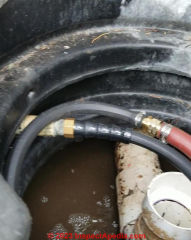 air hose into guide pipe (C) InspectApedia.com Roger