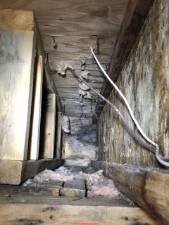 Mold contamination, rot, water damage, prior repairs and I-joist damage in a crawl space (C) InspectApedia.com Dan