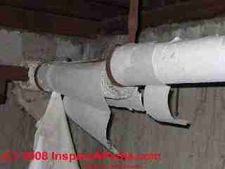 Asbestos pipe insulation in bad condition © D Friedman at InspectApedia.com 