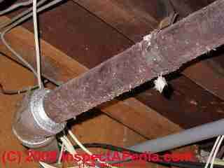 Amateur incomplete cleaning of asbestos on a heating pipe