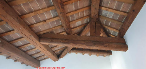Structural wood beam damage check, 100 year old Italian home (C) Inspectapedia.com Yvonne