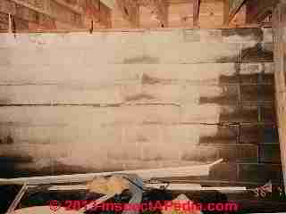 Block foundation wall mid-wall crack damage © Daniel Friedman at InspectApedia.com