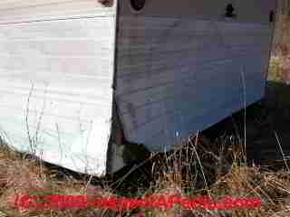 Damaged mobile home wall (C) Daniel Friedman