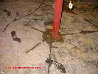 Cracked slab from water and frost © Daniel Friedman at InspectApedia.com