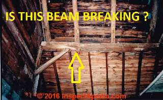 Sagging wood beam in an old barn © Daniel Friedman at InspectApedia.com