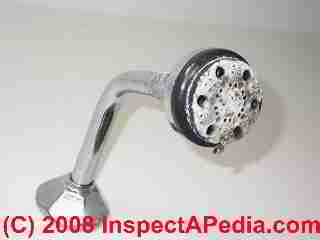 Photo of a mineral-coated bathroom shower head