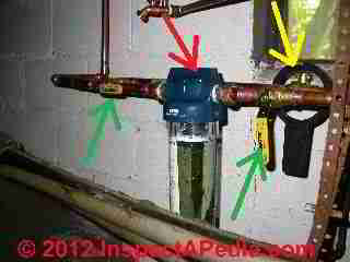 Filter installed to protect a UV light water treatment system © D Friedman at InspectApedia.com 