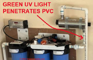 Viqua UV light connected to PVC pipe shines through at the unit - possible leak or damage risk? (C) InspectApedia.com Garcia
