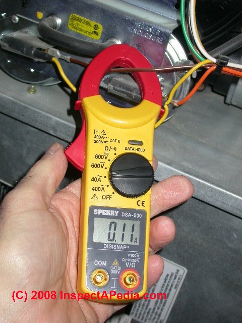 Sperry Digisnap clamp on ammeter digital VOM measuring current draw at a furnace (C) Daniel Friedman