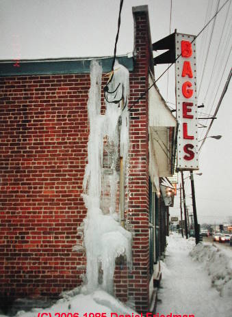 Photograph of ice on an electric meter and ice on the service entry cable at a building in Rhinebeck NY (C) Daniel Friedman