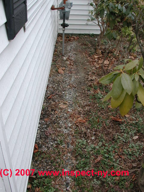 Photograph of a badly rusted furnace