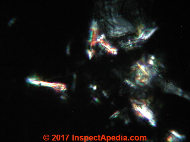 Johnson's Baby Powder Talc at 1200x in polarized light (C) Daniel Friedman InspectApedia.com