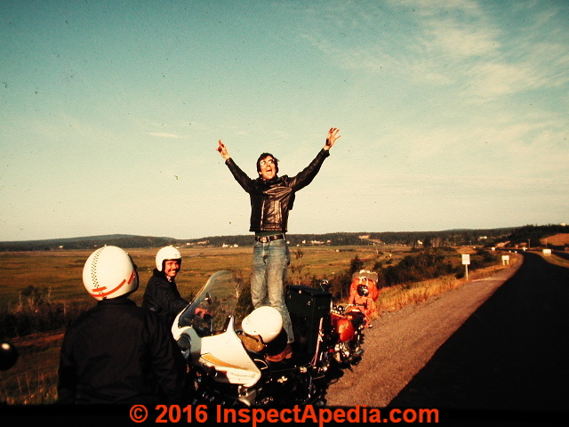 Daniel Friedman standing on his motorcycle - Nova Scotia bike trip (C) InspectApedia.com DJF