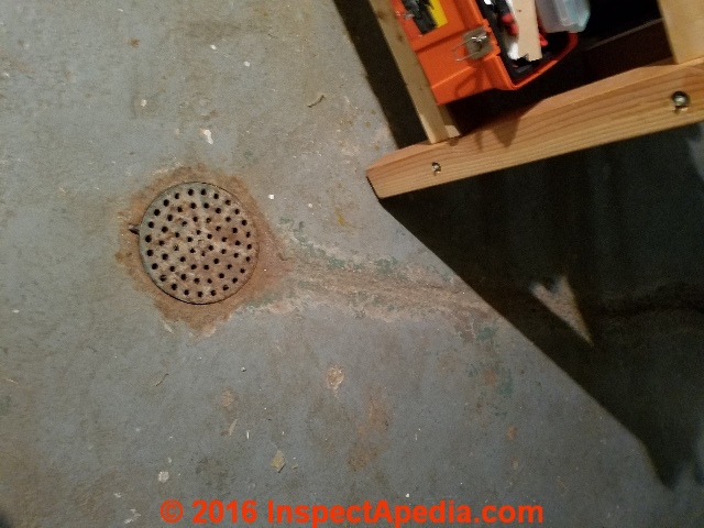 Sewer gas odor traced to dry floor drain connected to sewer line (C) Daniel Friedman
