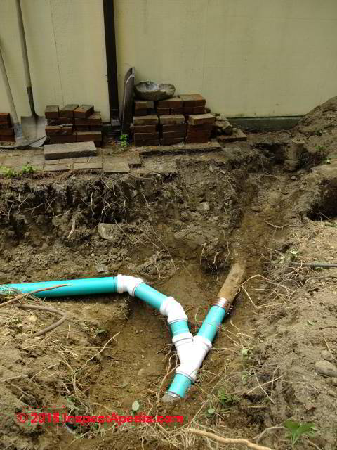Sewer piping being installed in NY © D Friedman at InspectApedia.com 