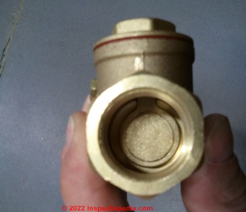 Brass swing type check valve (C) InspectApedia.com