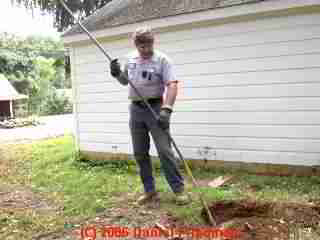the septic tank muck raking tool used to break up scum
and sludge layers during pumping.
