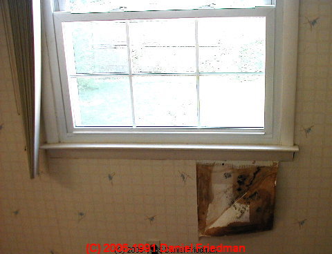 Mold formation on drywall and wallpaper below leaky window © D Friedman at InspectApedia.com 