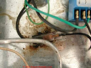 Spills shorted this igniter connector in a Jennair gas cooktop (C) Daniel Friedman at InspectApedia.com