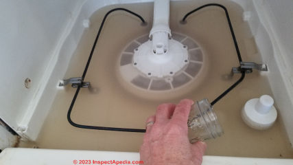 How to bail out & repair a flooded dishwasher that stopped draining (C) Daniel Friedman at InspectApedia.com