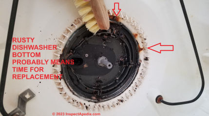 Clean the impeller housing on a Maytag dishwasher pump assembly (C) Daniel Friedman at InspectApedia.com