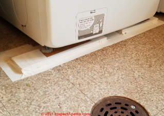 Board and tape stop washing macine creep (C) Daniel Friedman at InspectApedia.com