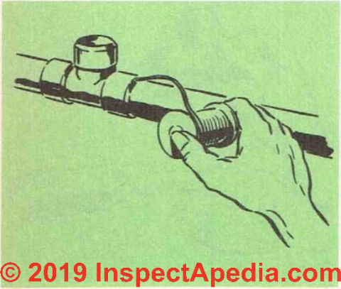 Figure 13: solder is drawn into the copper pipe joint during soldering  (C) (C) InspectApedia.com 2019.com 2019