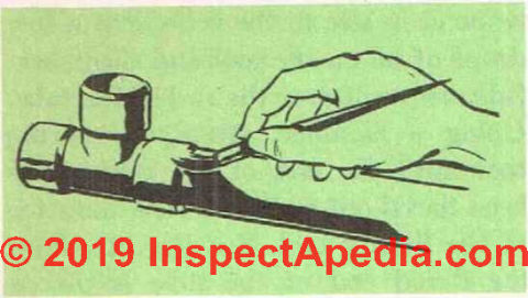 Figure 15: use a brush to remove excess solder from the joint (or a dry rag)  (C) (C) InspectApedia.com 2019.com 2019