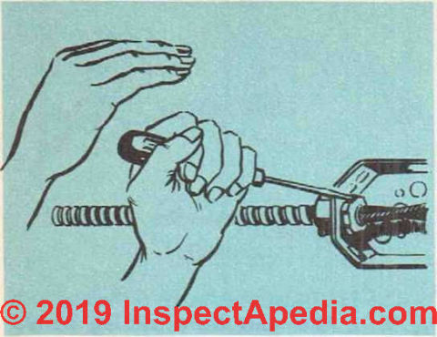 Fig. 13. Armored cable is secured to the outlet box by means of a lock nut, which can be tightened with a screwdriver.(C) InspectApedia.com 2019