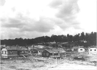 Cemesto homes under construction at Oak Ridge TN in 1943 - discussed at InspectApedia.com