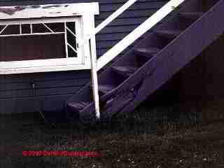 Rotted stair stringer (C) Daniel Friedman at InspectApedia.com