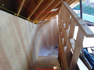 Curved stair under low roof, hazards ? (C) InspectApedia.com Chris