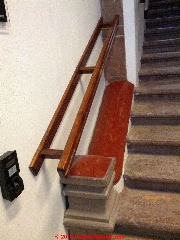 Handrail not graspable too far from walking surface (C) Daniel Friedman at InspectApedia.com