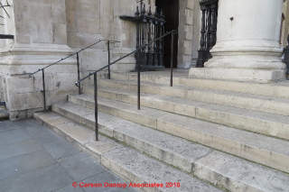 Wide stairs with directed pedestrian passage on a stairway in London, U.K. (C) Daniel Friedman at InspectApedia.com
