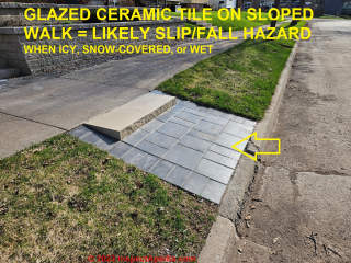 Ceramic tile sloped walkway ourdoors in Two Harbors Minnesota is a slip fall hazard (C) AC InspectApedia.com