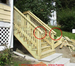 Snag hazard at stair guard top despite return at actual handrail (C) InspectApedia.com A Puentes