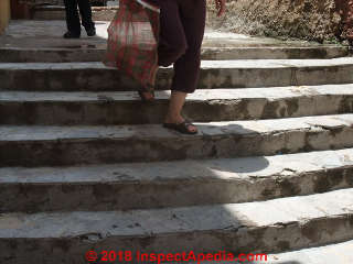 Descending curved stair while carrying shopping (C) Daniel Friedman