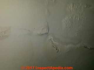 Effloresence damage on wall after leak repair - (C) InspectApedia.com Paul