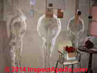 Effloresence white stains on concrete wall around form tie leaks (C) Daniel Friedman