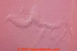 Mineral salts accumulating under paint (C) InspectApedia DH