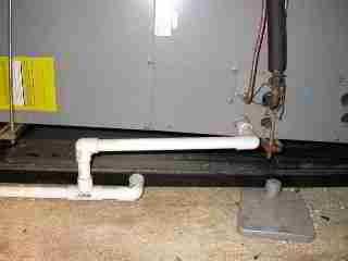 Photograph of a condensate tray drain