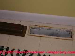 Photograph of rusty air conditioning duct register