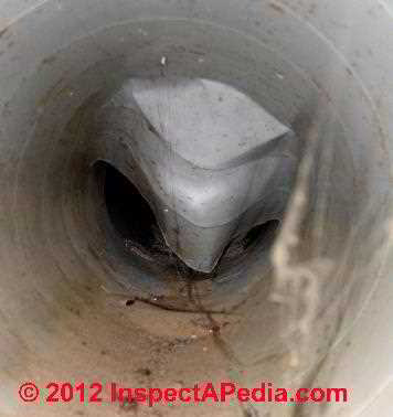 Water and rodents in air duct © D Friedman at InspectApedia.com 